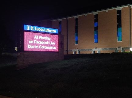 A church signboard that reads "All Worship on Facebook Live Due to Coronavirus".