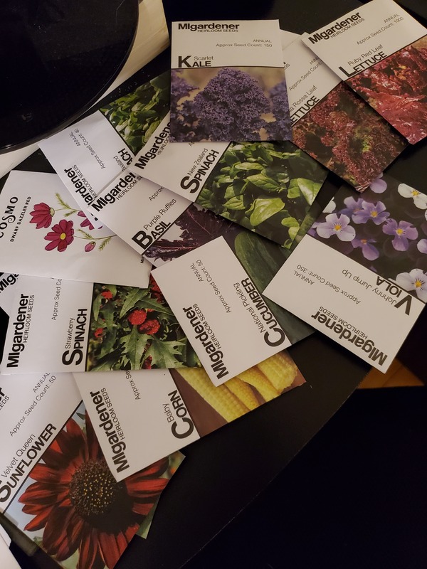 Scattered pile of seed packets.