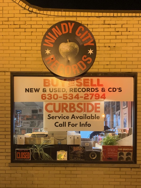 A record shop with curbside pickup. 