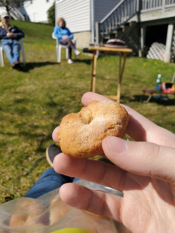 A person holding a cookie.