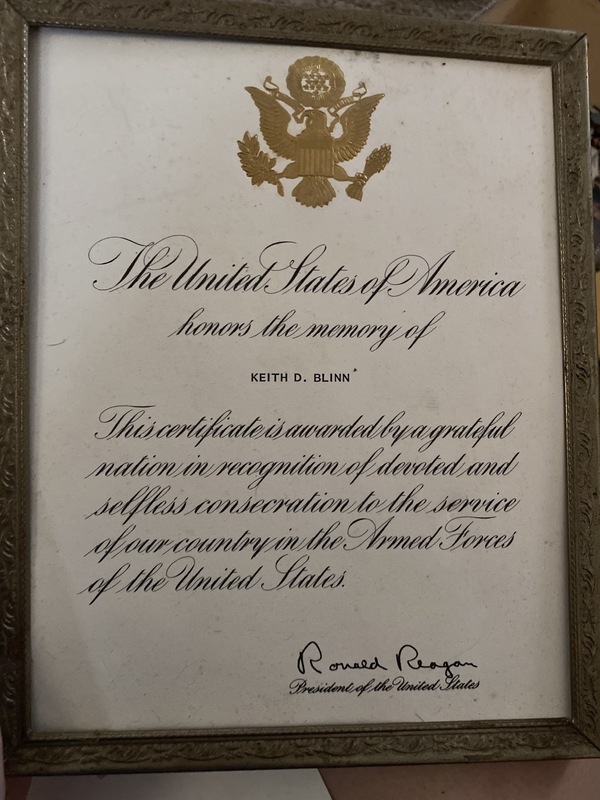 This is a picture of an official letter sent to the families of deceased military veterans that honors the memory of veteran in question. This particular letter is signed by Ronald Reagan. 