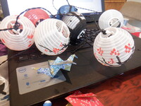 Crafts including origami and paper lanterns. 