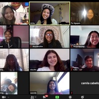 A screenshot of several smiling people on a Zoom call.