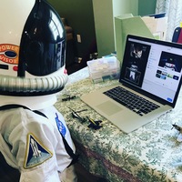 A child in an astronaut costume on zoom.
