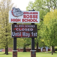 A school sign reading "All EVSC Schools Closed Until May 1st".