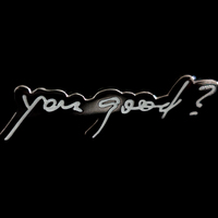 This is a picture of a graphic which depicts the words "You good?" in cursive against a black background. 