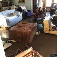 Image of a home in the aftermath of a flood.