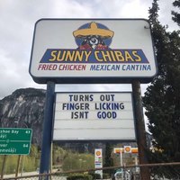 a Mexican restaurant sign with words underneath it saying "turns out finger licking isn't good"