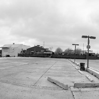 An empty parking lot. 