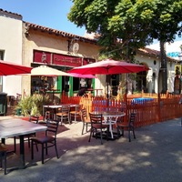 This is a picture taken of an outdoor seating area for a restaurant. 