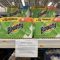 Photo of a paper products aisle at the store with a sign asking customers to only purchase one item.