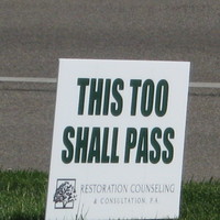 Image of a sign that says this too shall pass.