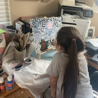 A photo of child painting.