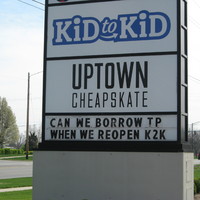 Image of a business billboard which reads can we borrow TP when we reopen?