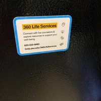 A sticker showing the various ways to contact mental health services at Arizona State University.