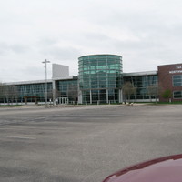 Image of an empty parking lot outside of a YMCA.