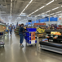 A photo of the inside of a Walmart grocery section. 