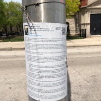 paper posted on pole with corona virus information